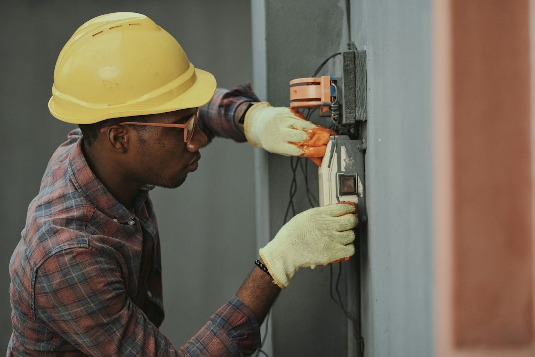 Building maintenance technician illustrating facility management jobs in Saudi Arabia