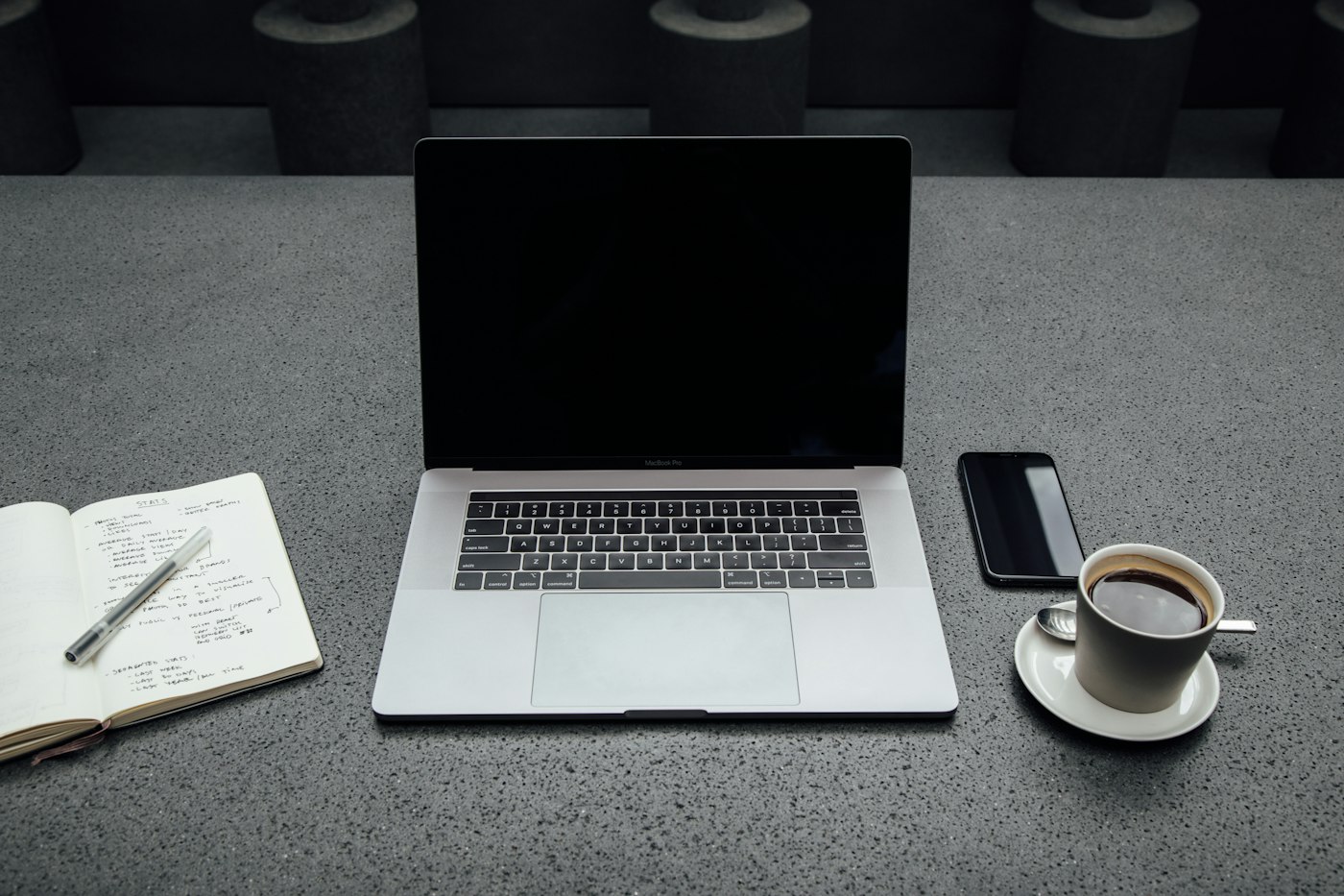 WhatsApp message to a recruiter prepared beside a laptop and notebook